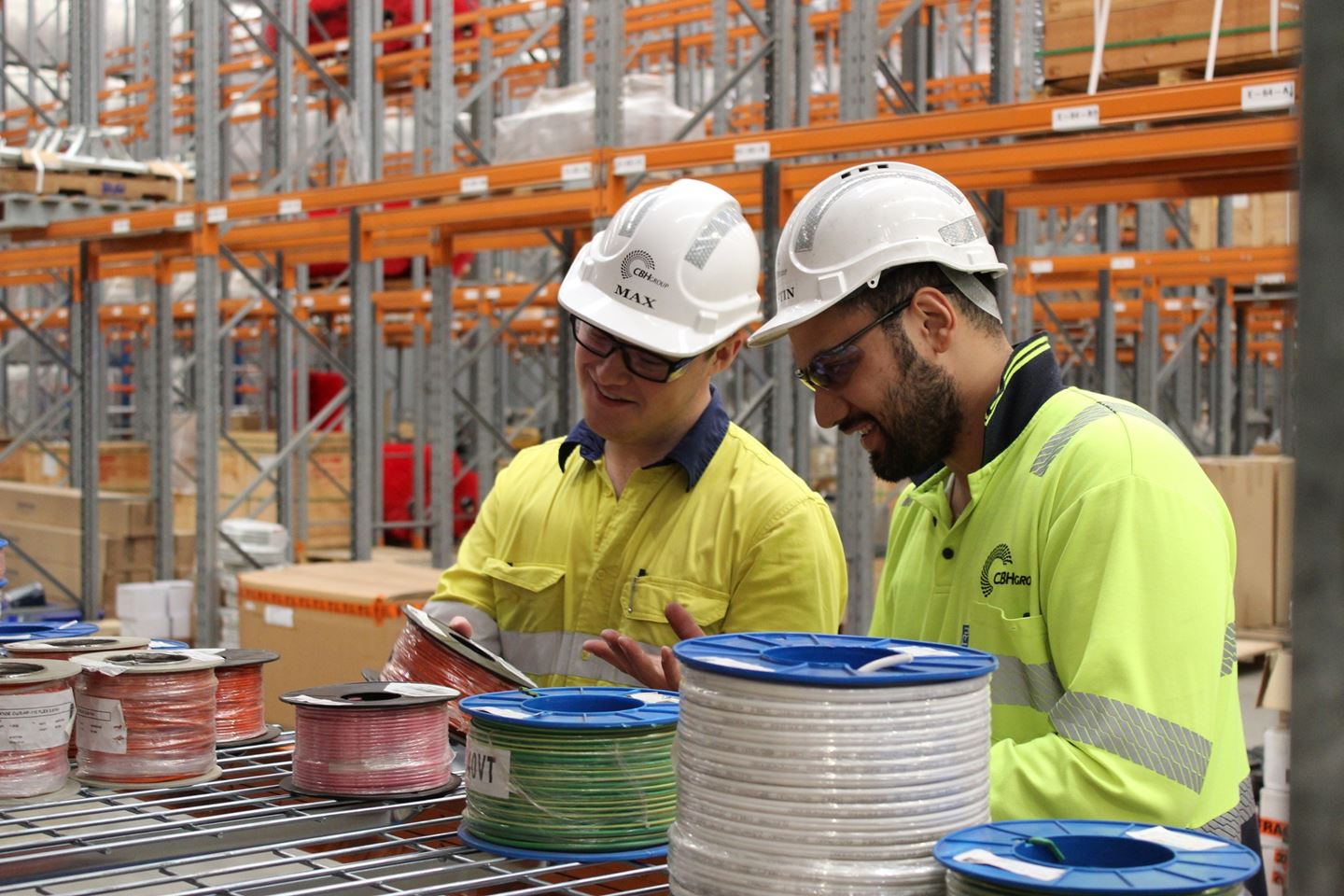 Warehouse staff looking at products